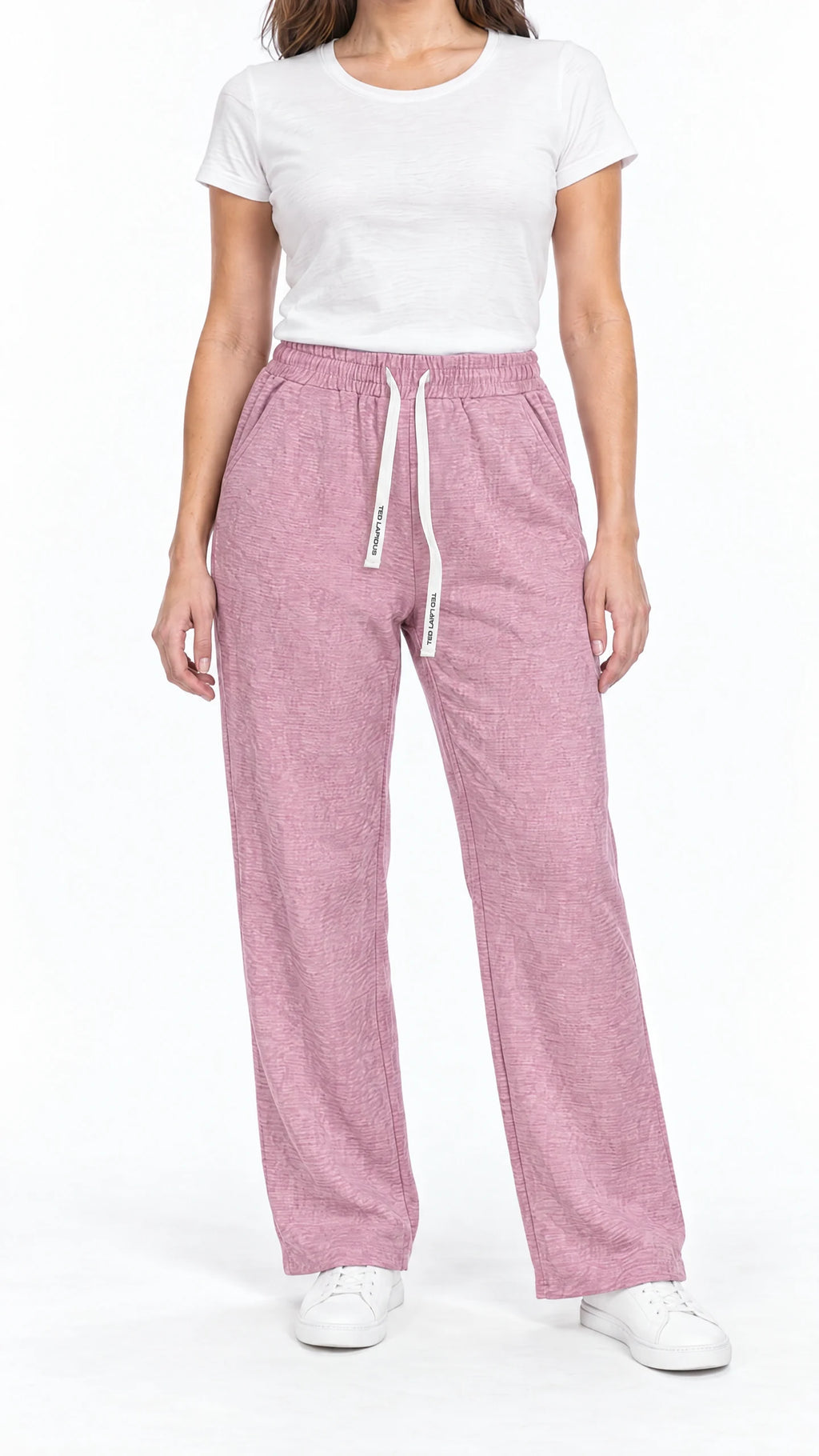 Pantalon thermo femme Ted Lapidus rose, coupe droite et taille élastiquée, porté de face.